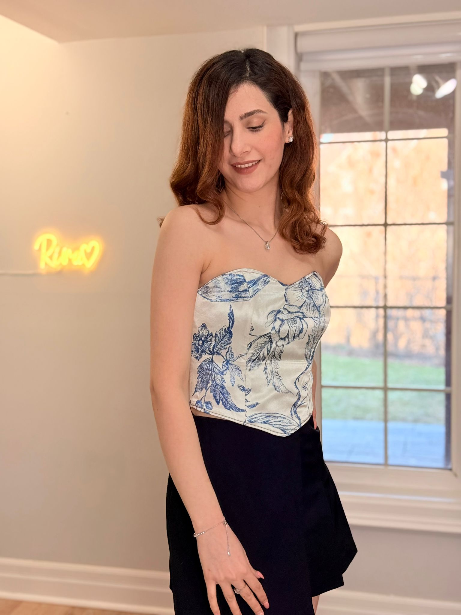 Strapless floral corset top in blue with adjustable lace-up back