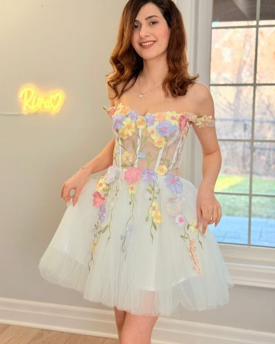 Model posing in the Scarlett off-shoulder 3D floral corset dress-dreamy romantic mini gown by Rira Gallery Canada